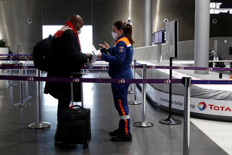 Police measures and sanitary checks at Roissy airport after French borders closed to non-essential travel