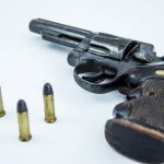 Closeup of a Revolver with Bullets