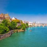 Old city center of Basel with Munster cathedral and the Rhine river, Switzerland, Europe.