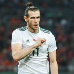 Wales competes against China during China Cup International Football Championship