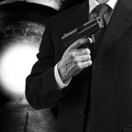 pistola y traje-1