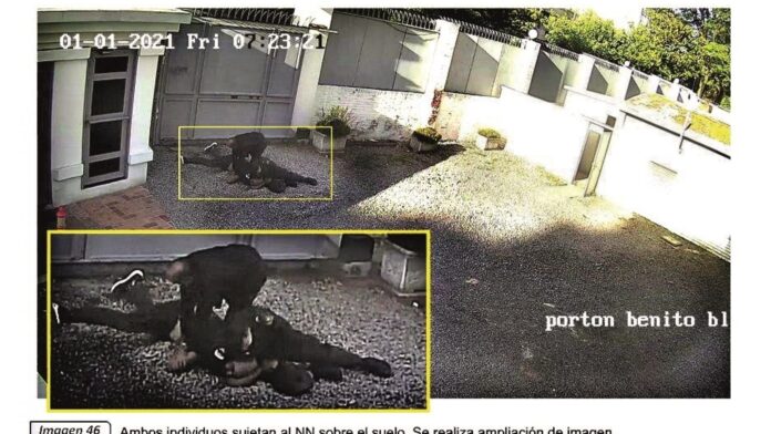Luca Ventre bloccato a terra dal poliziotto